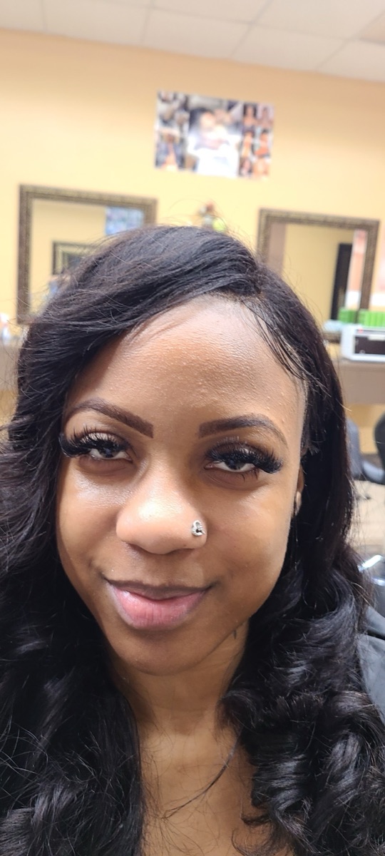 Beautifully shaped eyebrows after threading at Edge Threading & Waxing Studio in Stockbridge, GA