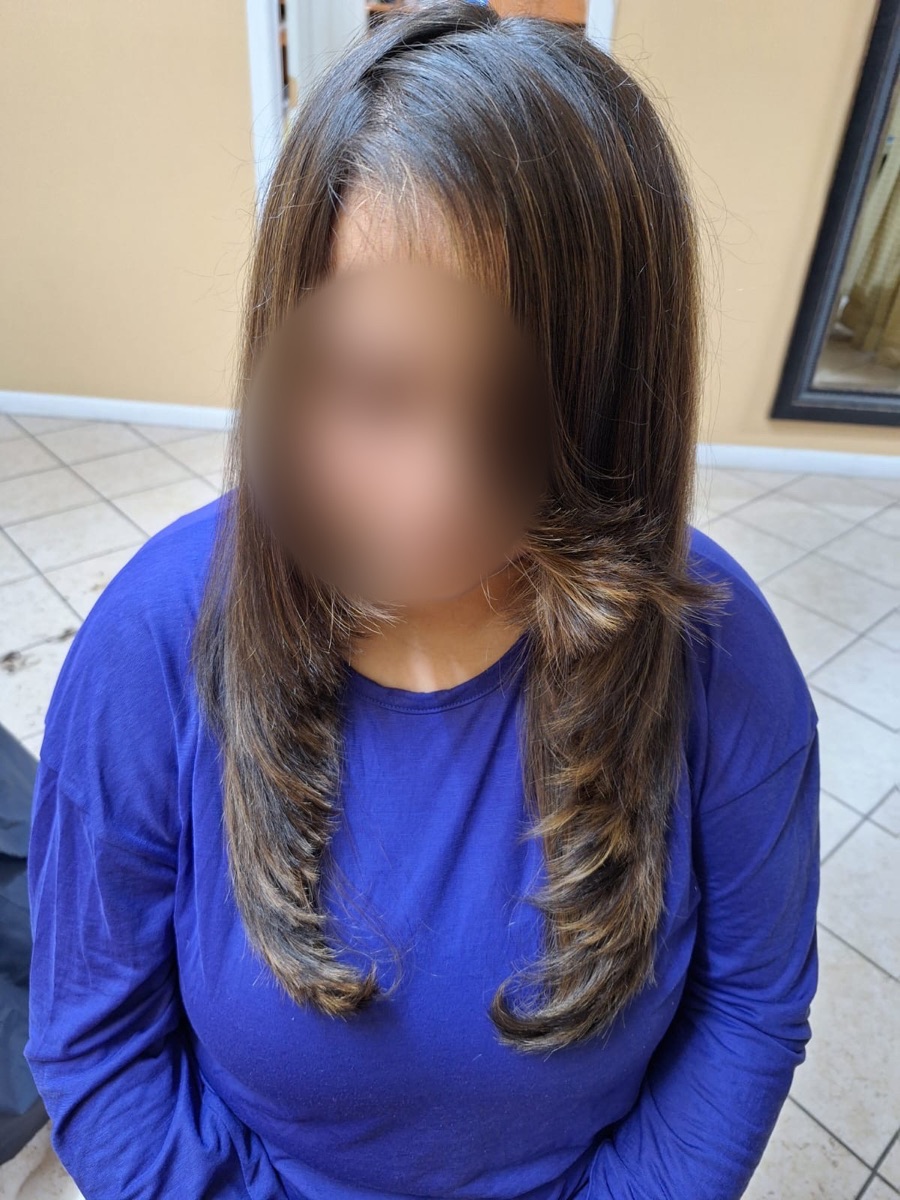 Smooth, layered hair after a treatment and style